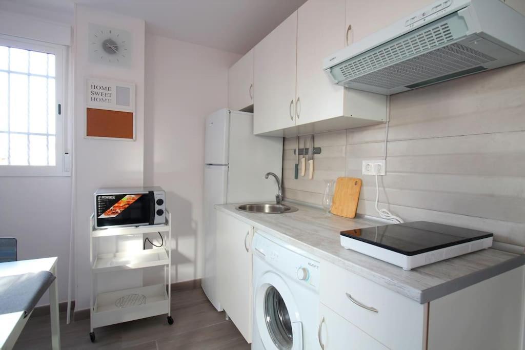 Suite Puerta Osario Con Terraza Sevilla Buitenkant foto